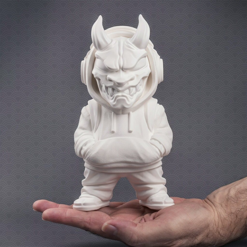 Image of white DIY oni figurine designer art toy with brush and red kanji character on gray background