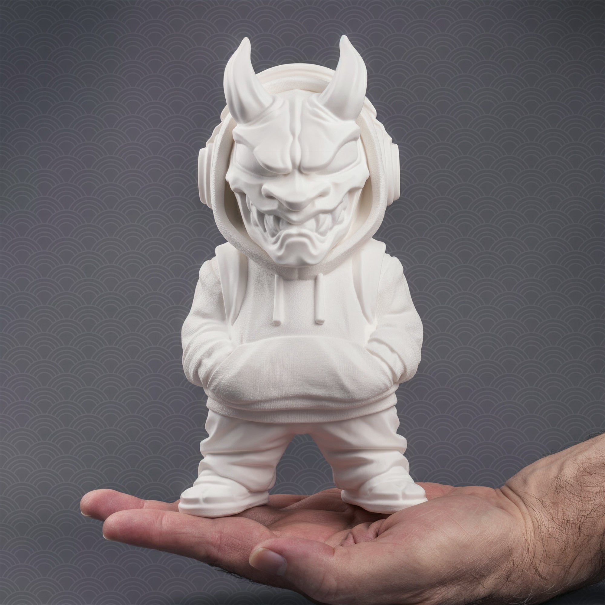 Image of white DIY oni figurine designer art toy with brush and red kanji character on gray background